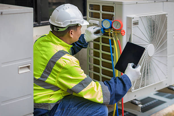 Professional Air Duct Cleaning technician working in Holly Springs, GA
